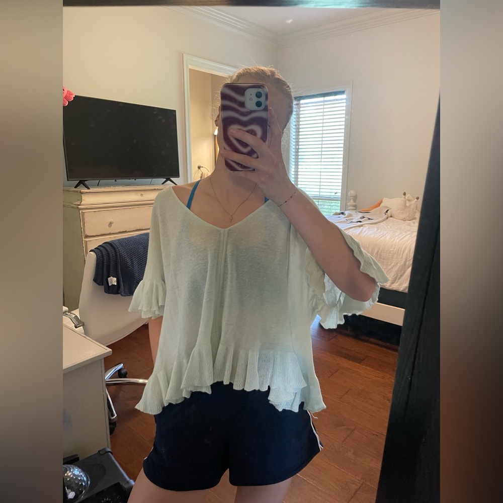 Oversized V-neck ruffle top